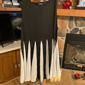 KISS Milk size 20, silky, black dress with diagonal white skirt inserts.  Dressy